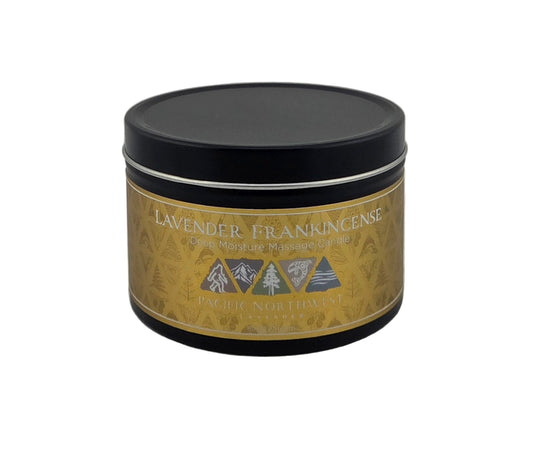 Candle jar with a gold label and black lid on a gray background