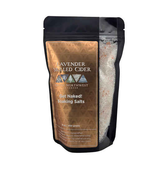 Packaged product labeled 'Lavender Mulled Cider' with a gold label on a gray background